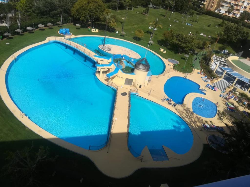 Bazén v ubytování Luxury Apartamento Minerva Júpiter nebo v jeho okolí