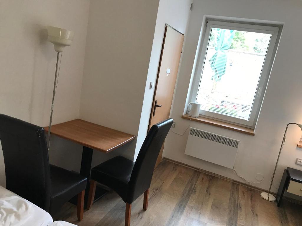 Postel nebo postele na pokoji v ubytování Penzion Nová Hospoda
