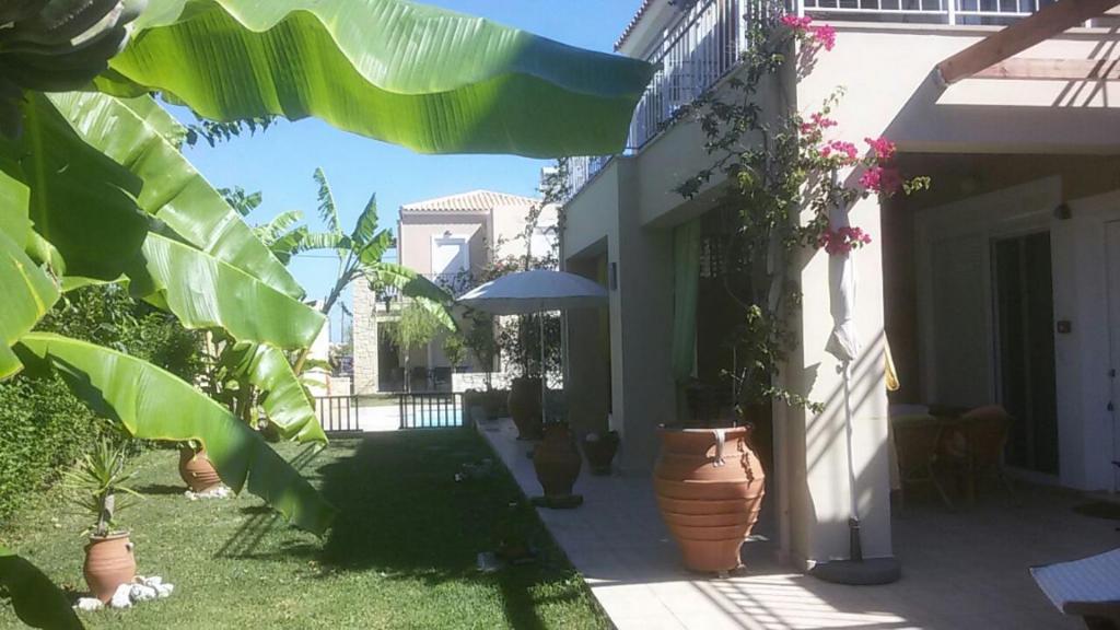 A garden outside Cretamos Seaside Villas