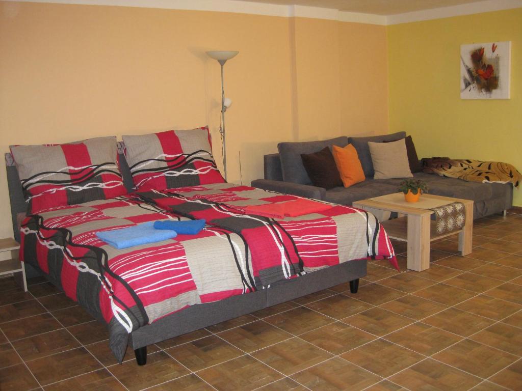 Postel nebo postele na pokoji v ubytování Apartmány včelka