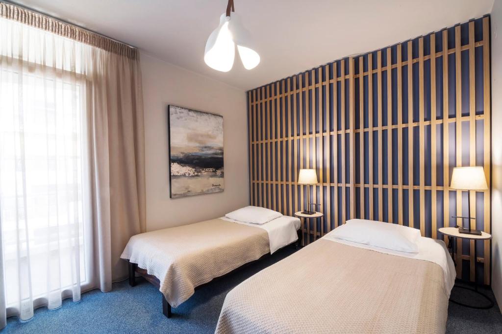 Marina Alimos Hotel Apartments - سكن الأسرة مع عرض البحر