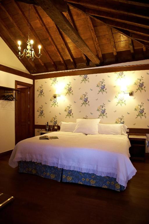 Postel nebo postele na pokoji v ubytování Hotel Emblemático San Agustin
