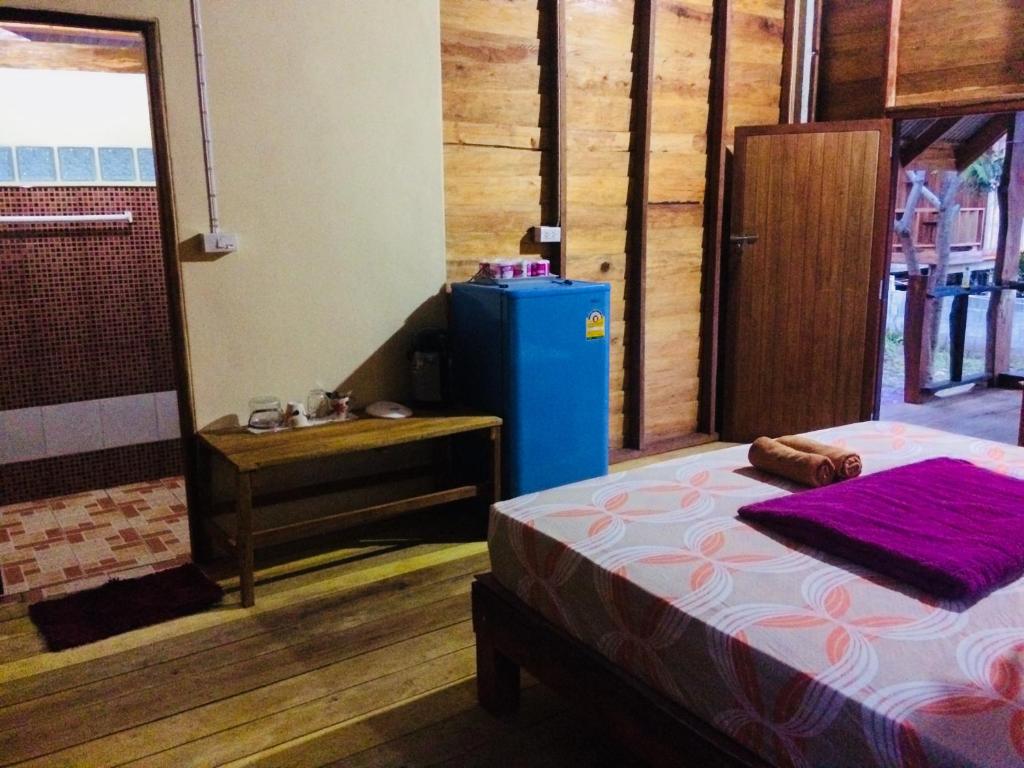Postel nebo postele na pokoji v ubytování Gardenhomeresortkohjum