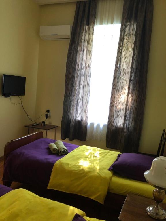 Postel nebo postele na pokoji v ubytování La Deka GuestHouse