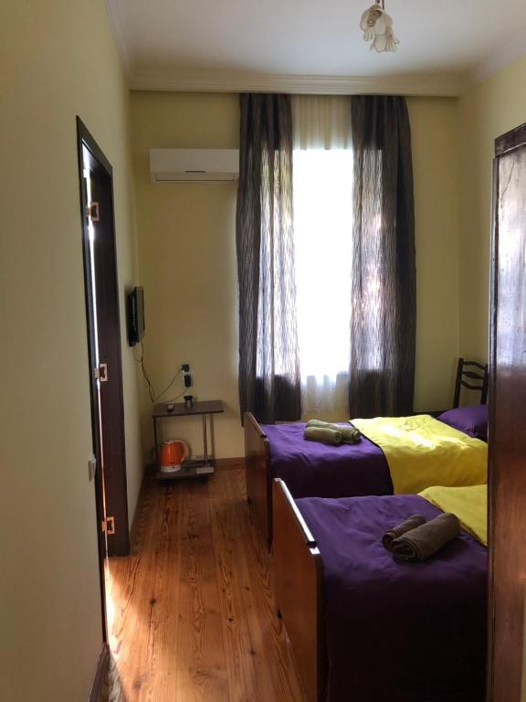 Postel nebo postele na pokoji v ubytování La Deka GuestHouse