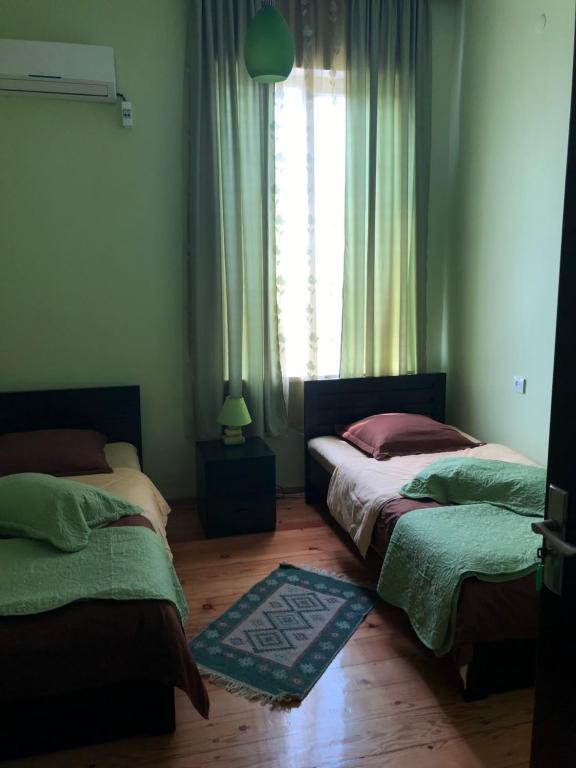 Postel nebo postele na pokoji v ubytování La Deka GuestHouse