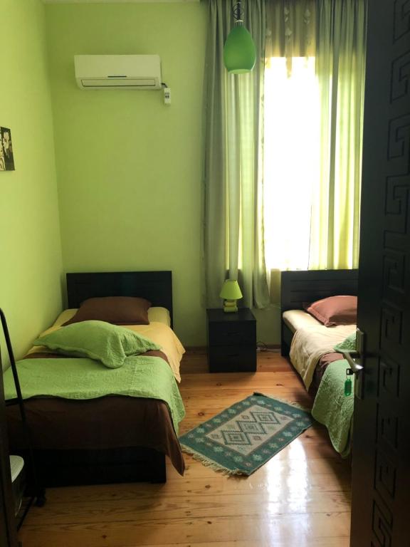 Postel nebo postele na pokoji v ubytování La Deka GuestHouse
