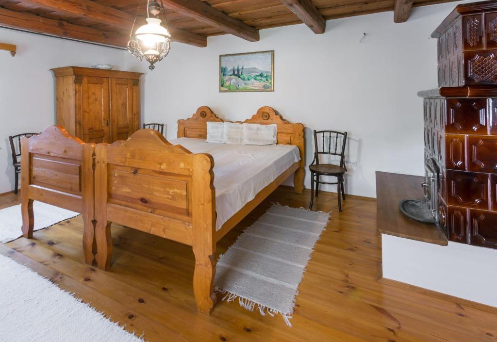 Postel nebo postele na pokoji v ubytování Káli KŐ Apartman