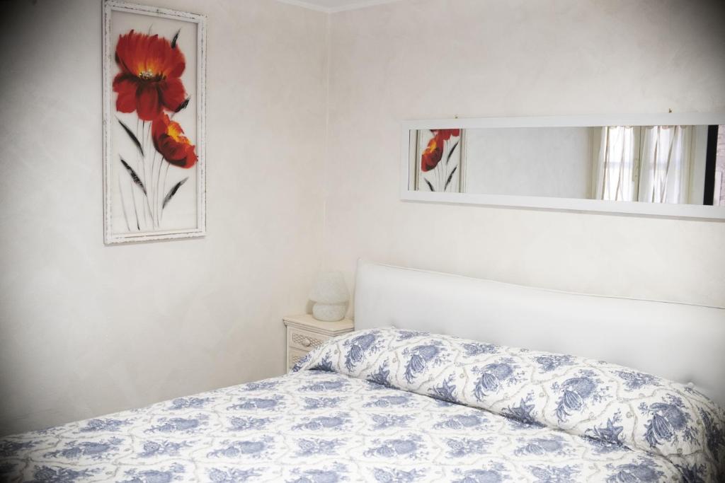 Postel nebo postele na pokoji v ubytování B&B Appartamenti l'Anfora