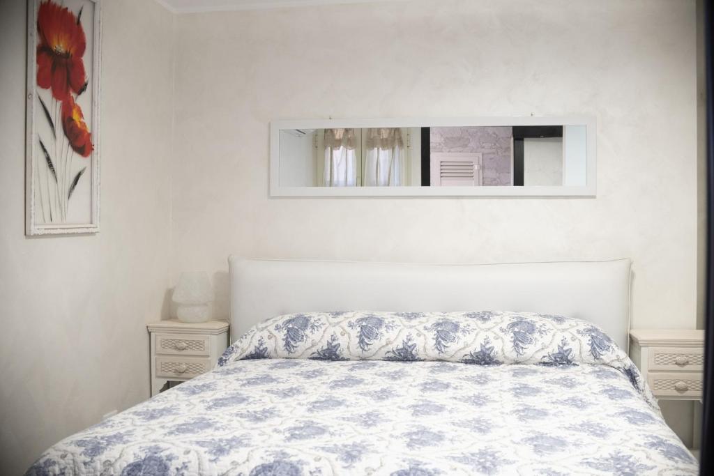 Postel nebo postele na pokoji v ubytování B&B Appartamenti l'Anfora