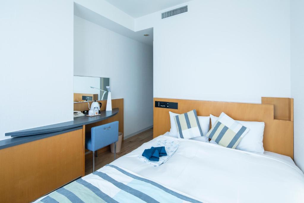 Postel nebo postele na pokoji v ubytování Hotel Flex