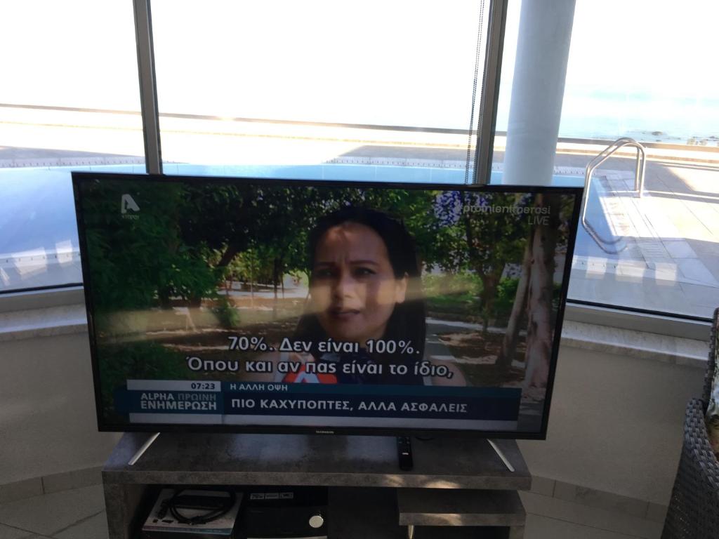 TV a/nebo společenská místnost v ubytování Elite Sea View Villa