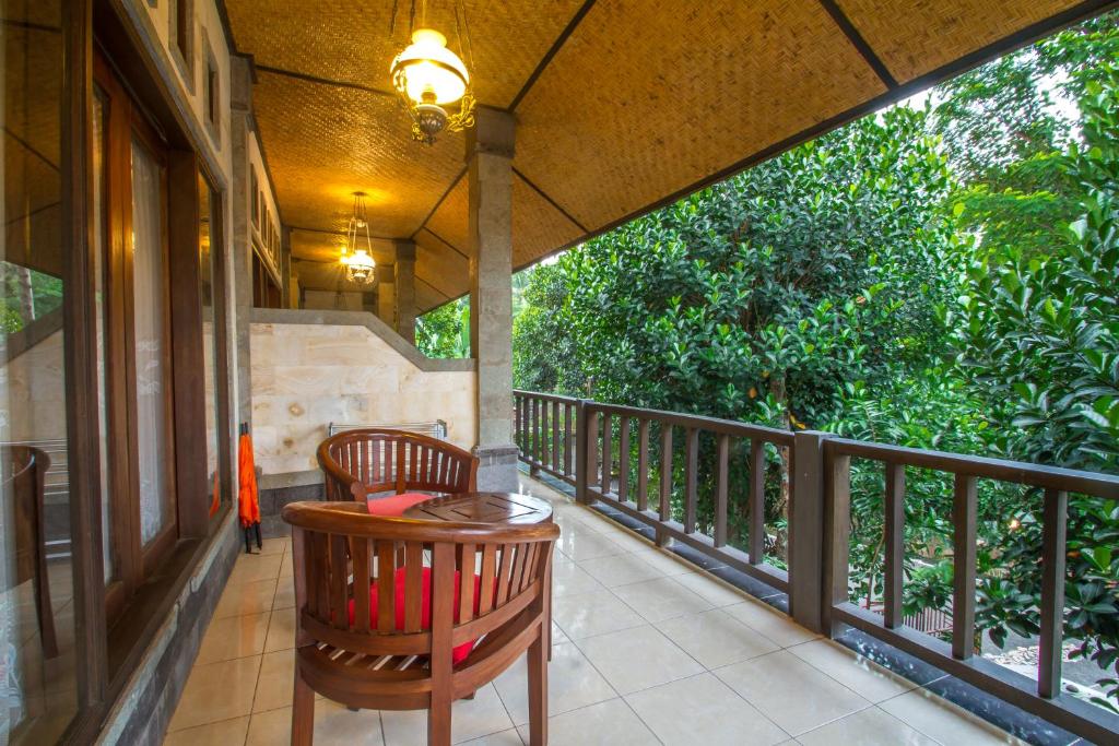 Balkón nebo terasa v ubytování Adi Jaya Cottages Ubud Suites by EPS - CHSE Certified