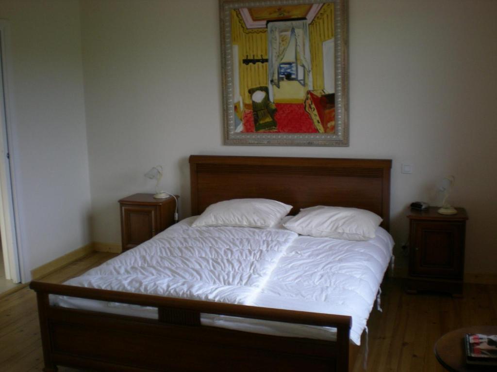 Ένα ή περισσότερα κρεβάτια σε δωμάτιο στο LA VIGNERAIE