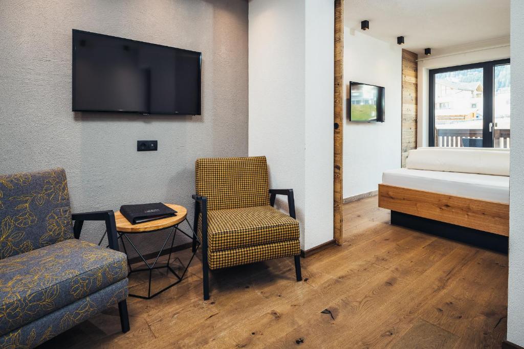 TV a/nebo společenská místnost v ubytování Hotel Cores