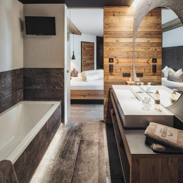 Postel nebo postele na pokoji v ubytování Hotel Cores