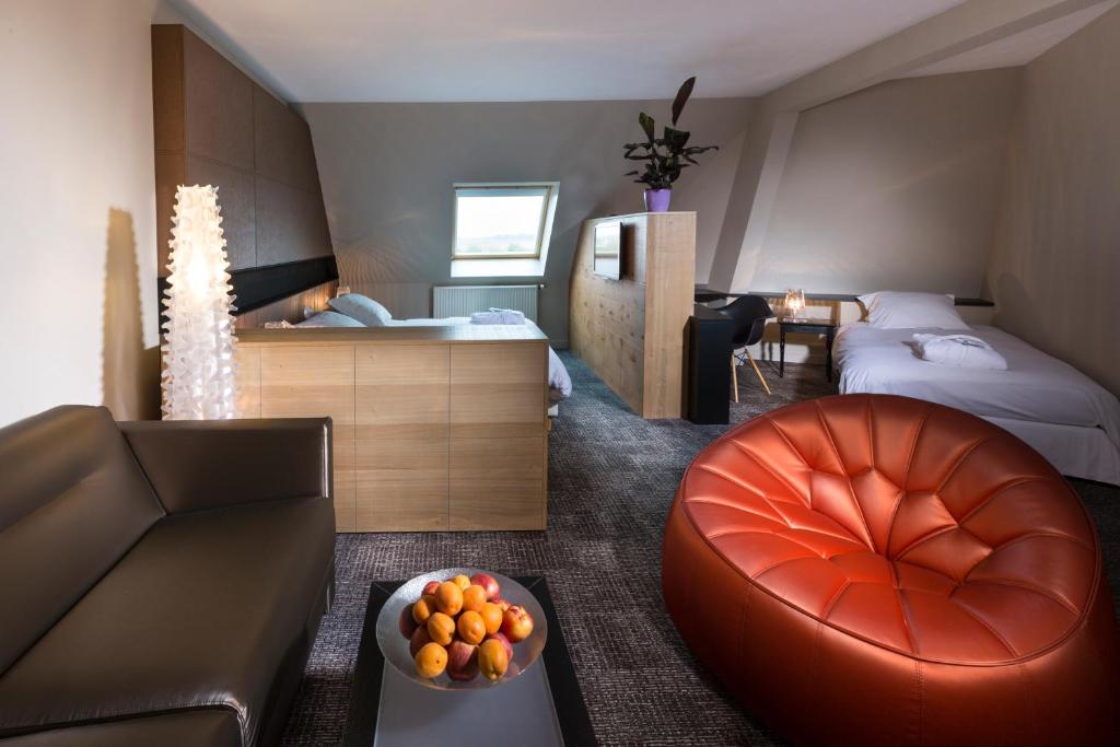 Postel nebo postele na pokoji v ubytování Hotel L'Europe