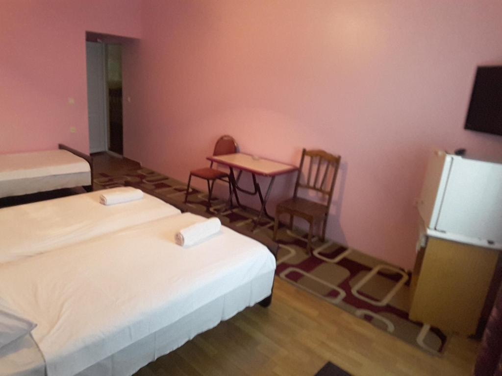 Postel nebo postele na pokoji v ubytování Hotel Lika