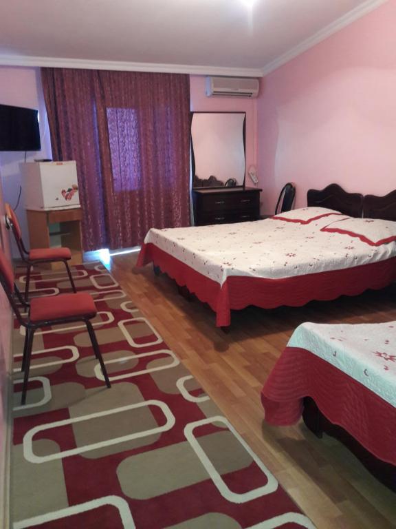 Postel nebo postele na pokoji v ubytování Hotel Lika