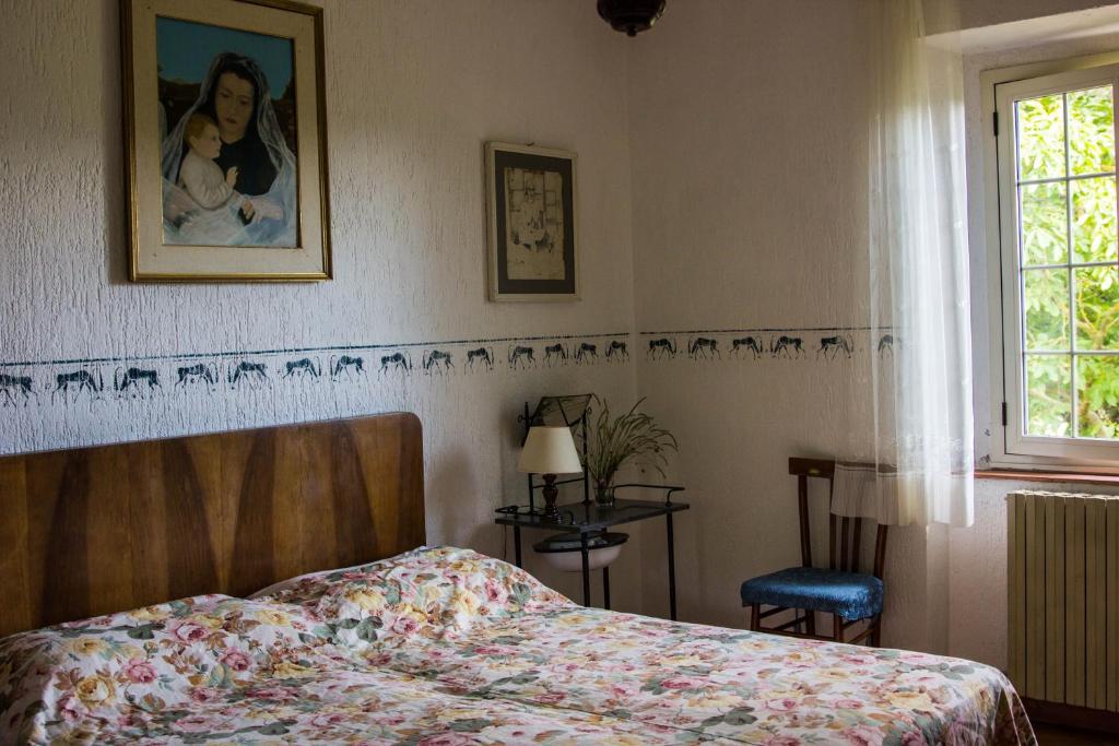 Posteľ alebo postele v izbe v ubytovaní Podere Le Chiuse