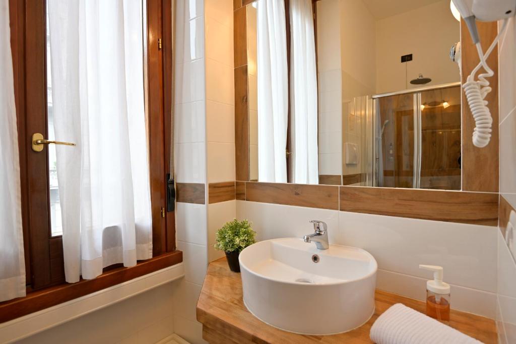 Koupelna v ubytování Hotel Bagliori