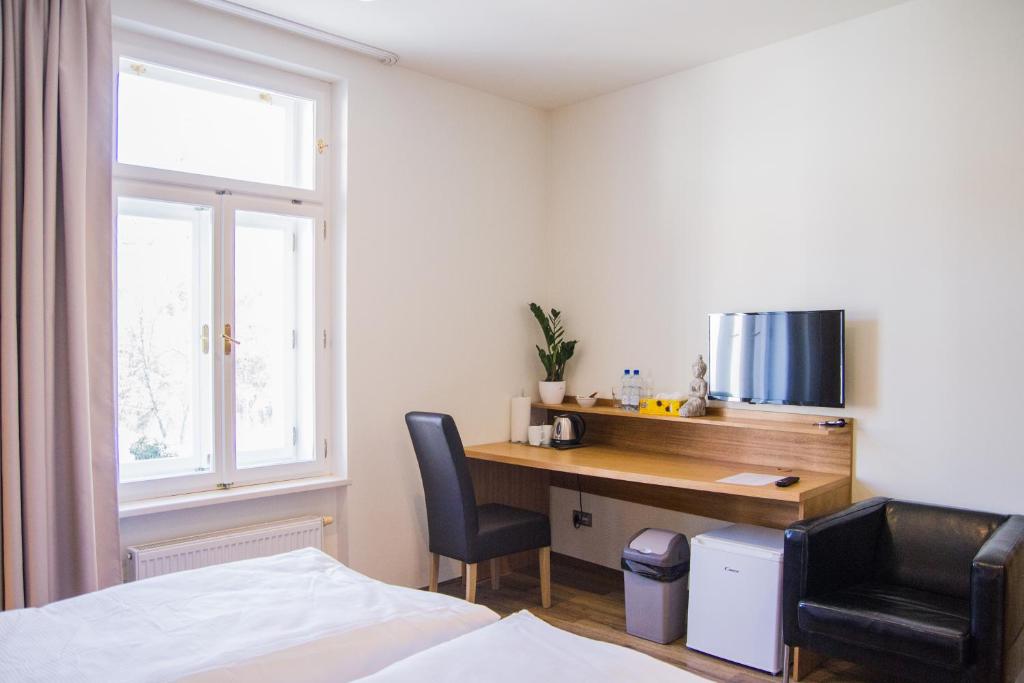 Postel nebo postele na pokoji v ubytování APART U LVA