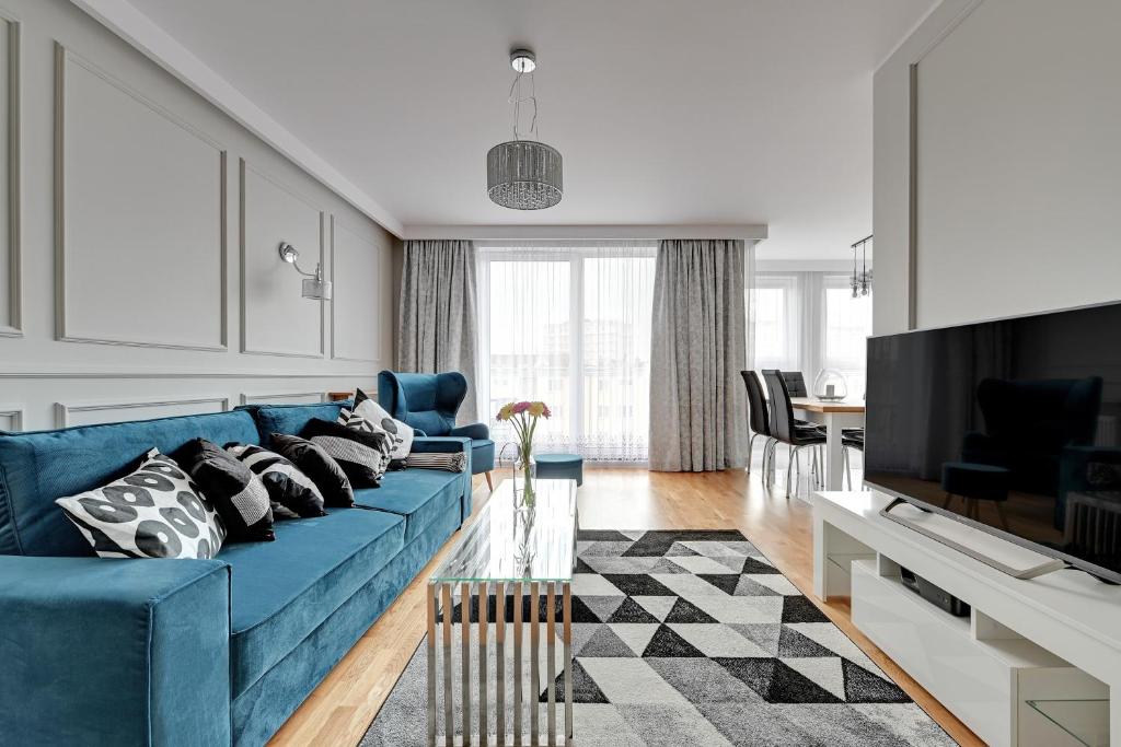 TV a/nebo společenská místnost v ubytování Blue Mandarin Marina