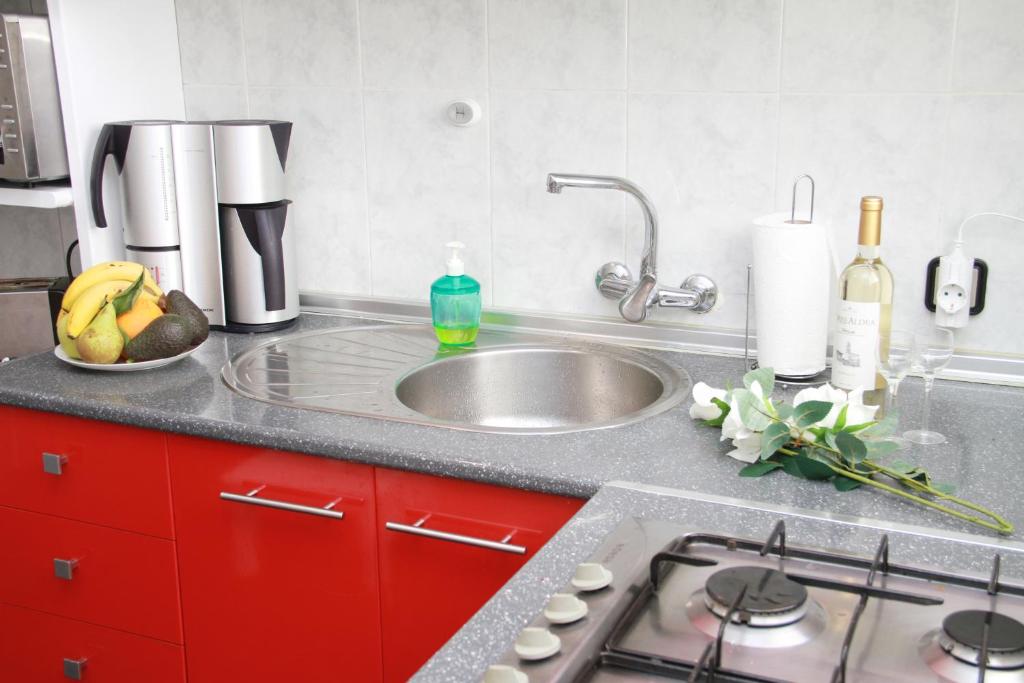 A kitchen or kitchenette at Shiny Per Family Apartment