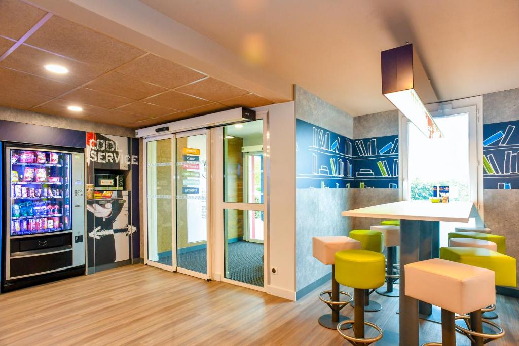 Kuchyň nebo kuchyňský kout v ubytování ibis budget Coutances