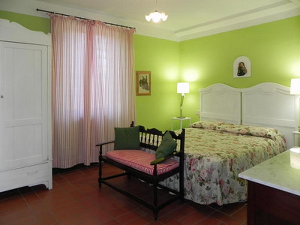 Postel nebo postele na pokoji v ubytování Vignagrande Agriturismo
