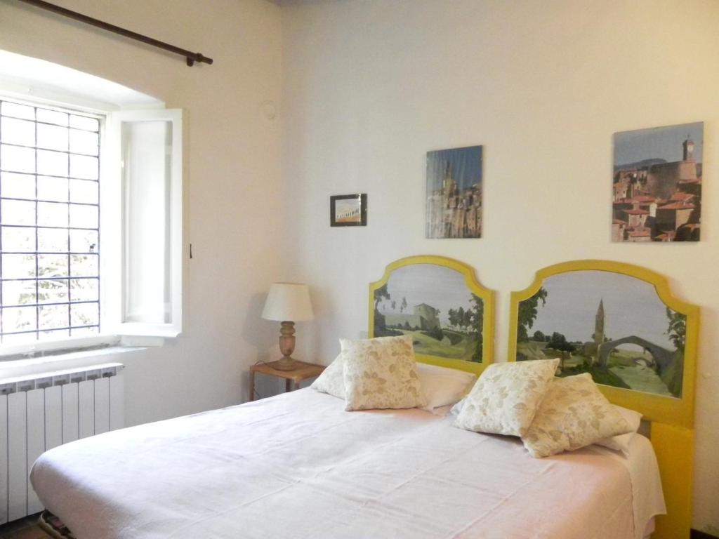 Postel nebo postele na pokoji v ubytování Vignagrande Agriturismo