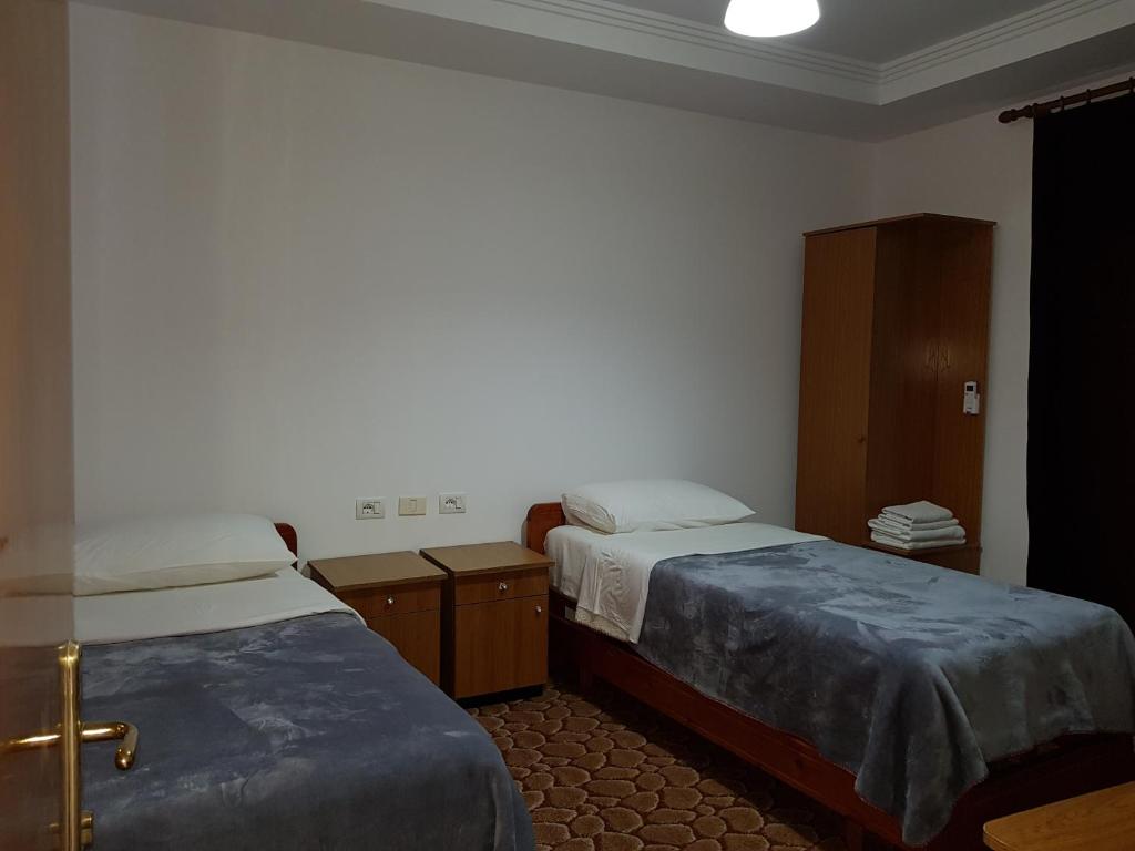 Letto o letti in una camera di Hotel Verzaci