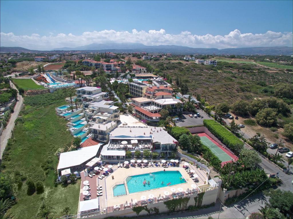 an aerial view of a resort with a swimming pool at Rethymno Mare Royal & Water Park in Skaleta