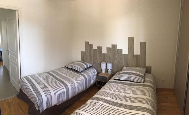 Postel nebo postele na pokoji v ubytování Art mony