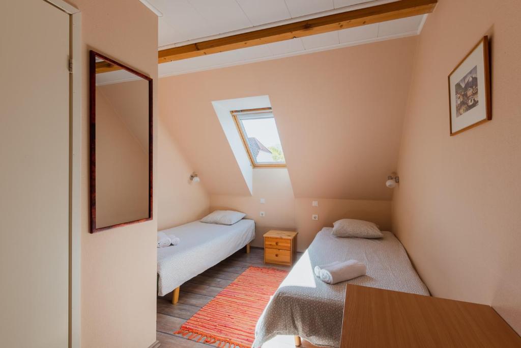 Postel nebo postele na pokoji v ubytování Kuressaare Central Hostel