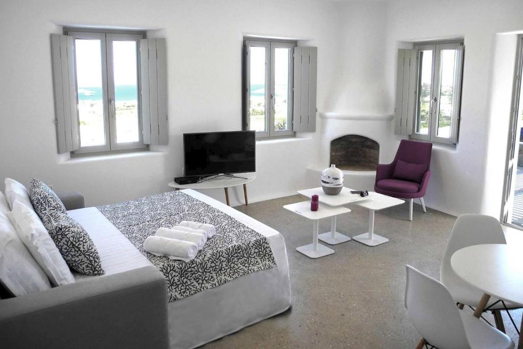 Televízia a/alebo spoločenská miestnosť v ubytovaní Angels Estate Precious Villas