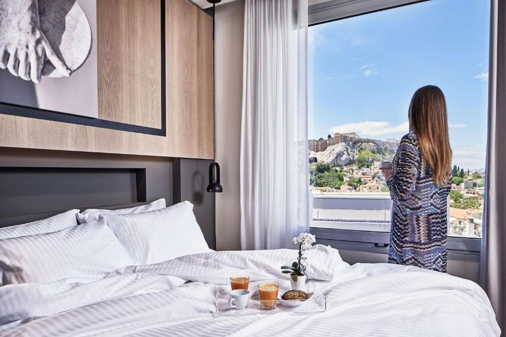 Llit o llits en una habitació de Urban Frame Plaka
