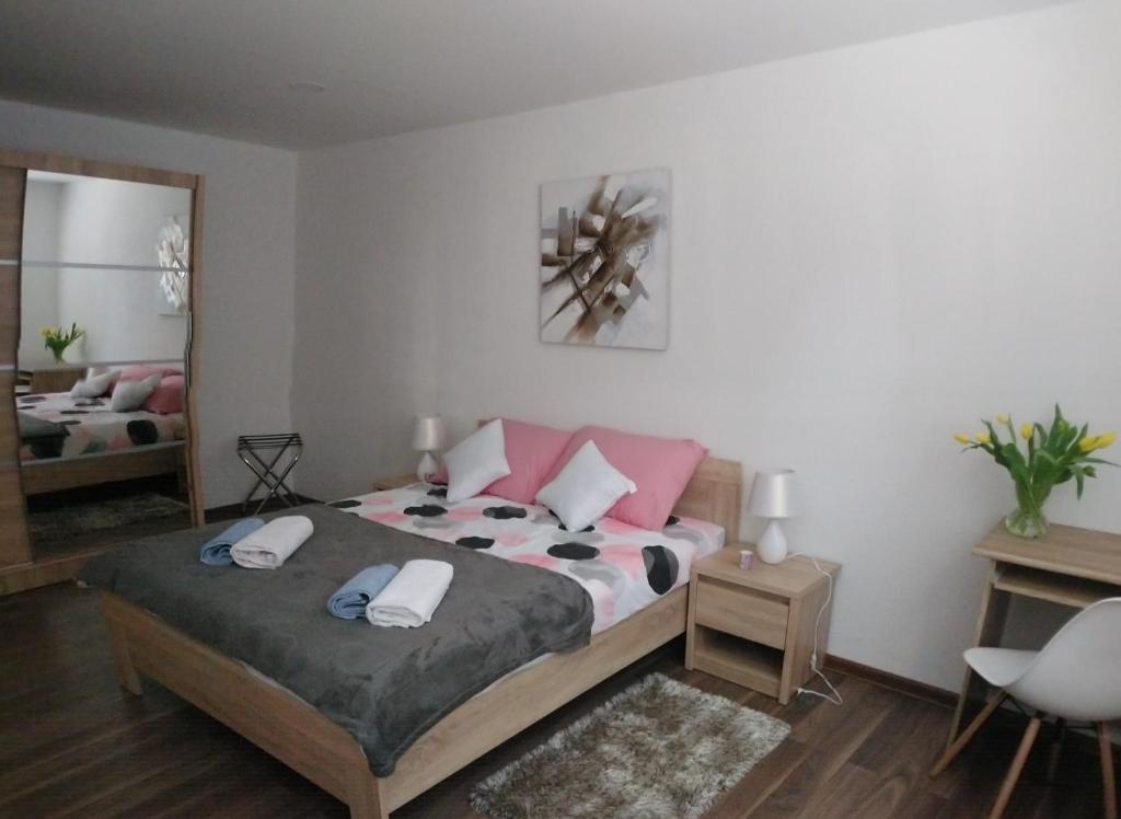 Postel nebo postele na pokoji v ubytování Apartman Danijela