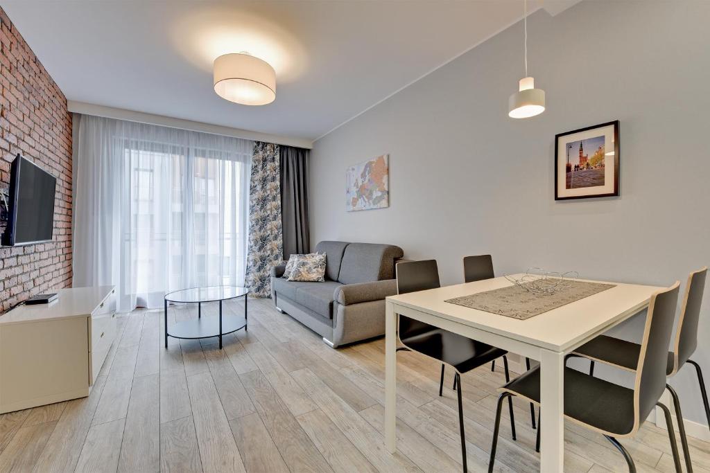 Posedenie v ubytovaní Aura Island Riverside by Downtown Apartments