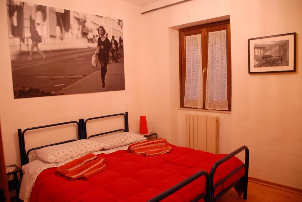 Postel nebo postele na pokoji v ubytování Fattoria Nonno Neno B&B