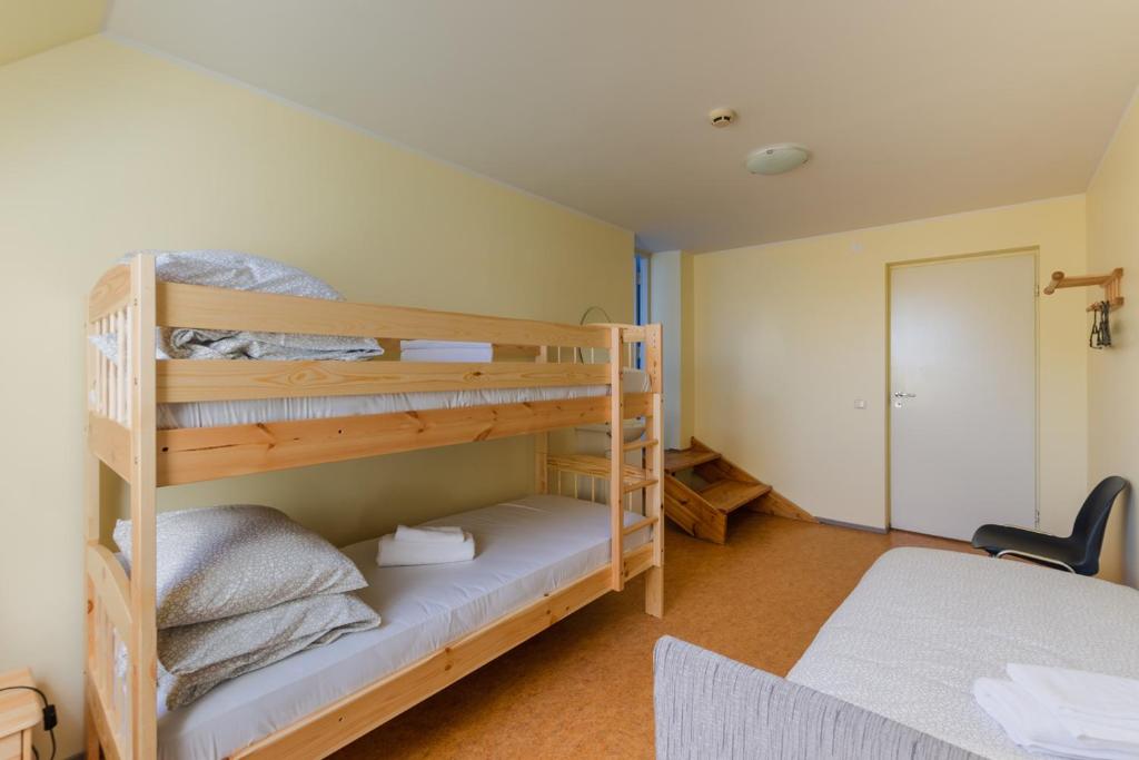 Postel nebo postele na pokoji v ubytování Kuressaare Central Hostel