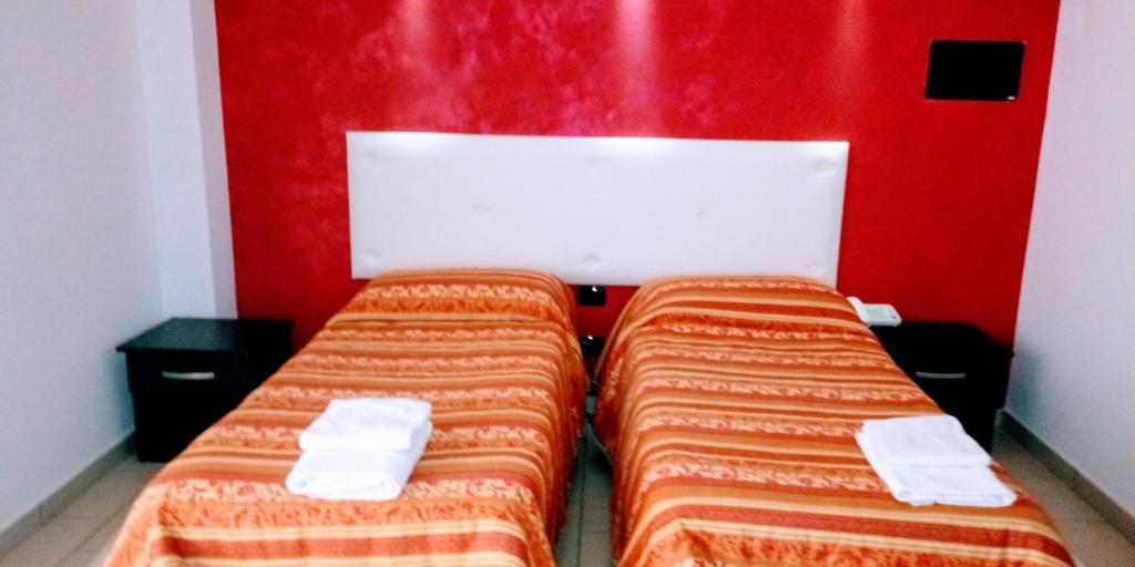 Postel nebo postele na pokoji v ubytování Hotel 660