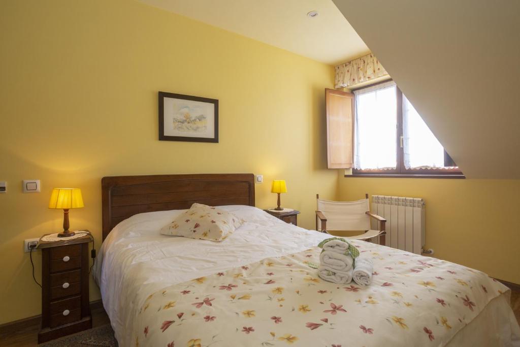 Cama o camas de una habitación en Hotel Rural As Laguas