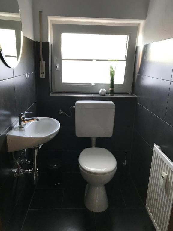 Koupelna v ubytování xxl Apartment Sinsheim