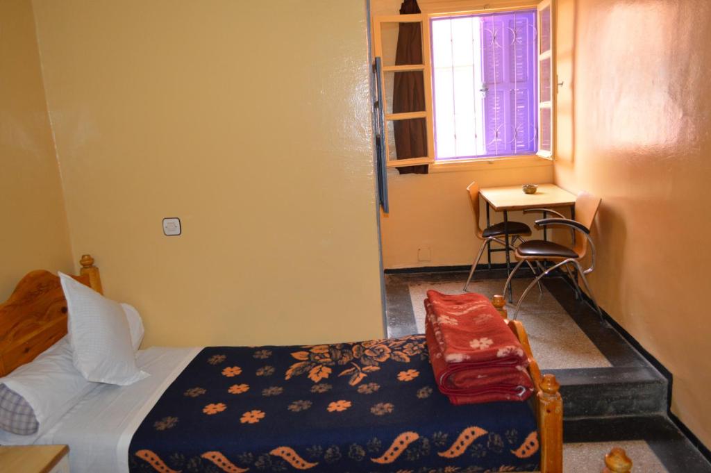 Postel nebo postele na pokoji v ubytování Hotel Atlas Ouarzazate