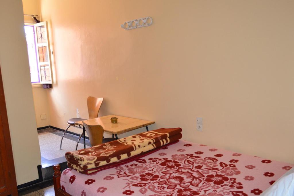 Postel nebo postele na pokoji v ubytování Hotel Atlas Ouarzazate