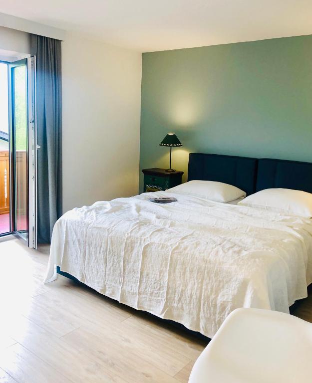 Posteľ alebo postele v izbe v ubytovaní Hotel Sonnenhof - bed & breakfast & appartements