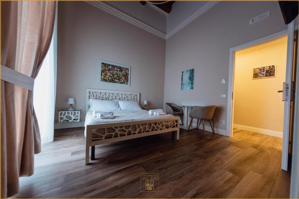 Postel nebo postele na pokoji v ubytování Villa Cua