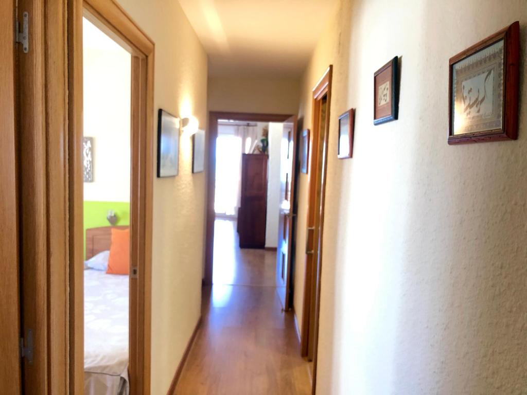 Postel nebo postele na pokoji v ubytování Cunit Playa 2