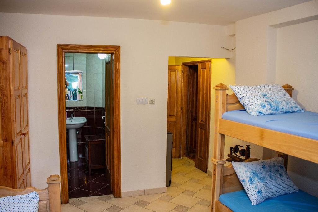 Letto o letti in una camera di Guest House Šljuka